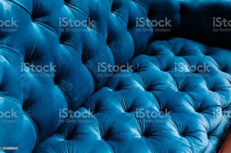 Velvet Couch Background Texture With Sunken Buttons Stock Photo