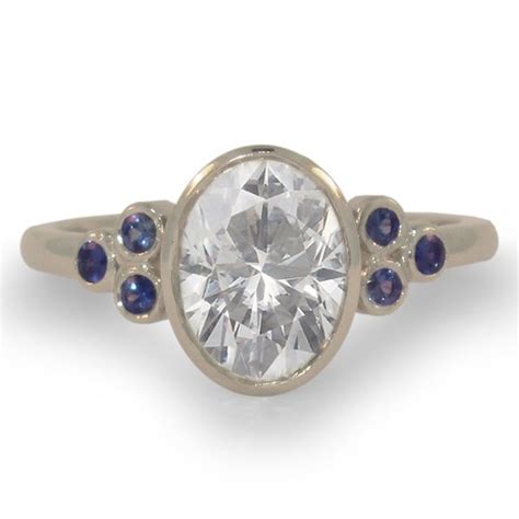 Shop some of our fave rings styles below. Two Carat White Sapphire Engagement Ring 2.34 carat white lab sapphire with blue sapphire accent ...