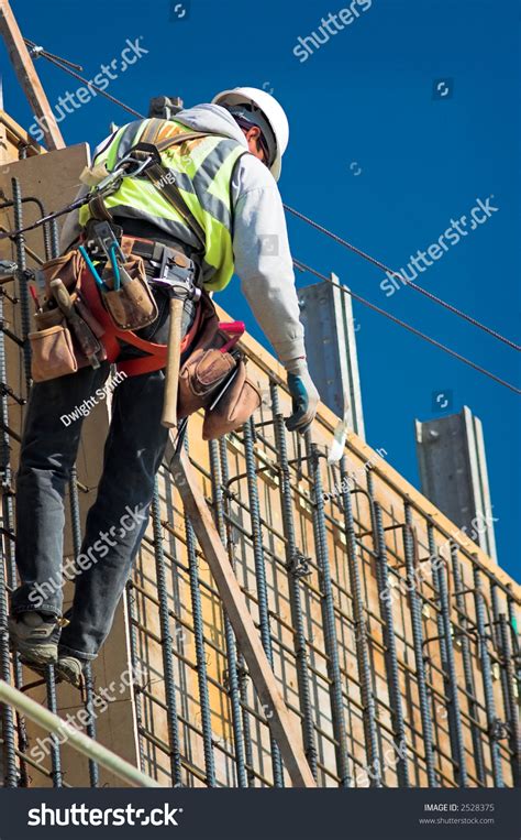 Construction Worker On High Wall Stock Photo 2528375 Shutterstock