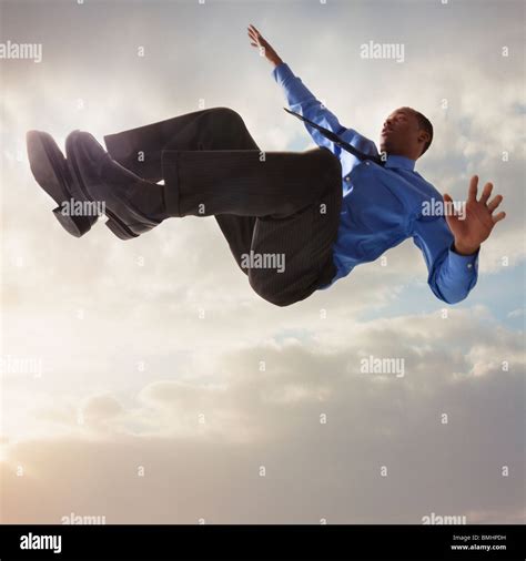 Businessman Falling From The Sky Stock Photo Alamy
