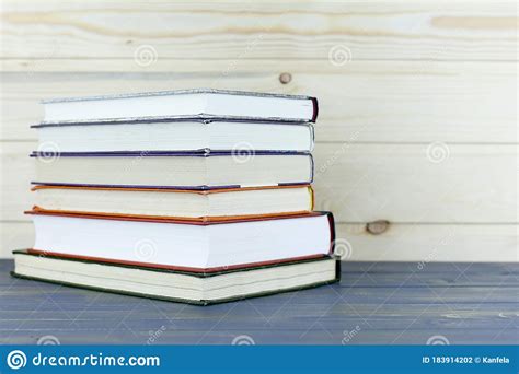 A Pile Of Books With Library On The Back Stock Photo Image Of Book