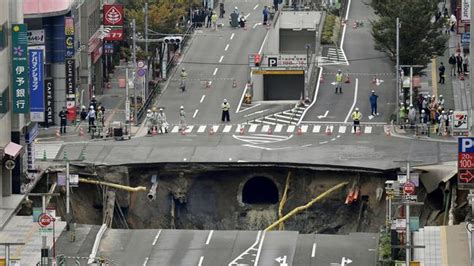 Giant Sinkhole Swallows Five Lane Road In Fukuoka Japan