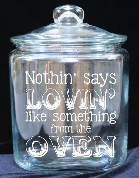 there is a glass jar with words on it