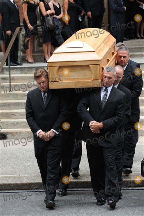Photos And Pictures Pallbearers Carry The Casket Of Well Known