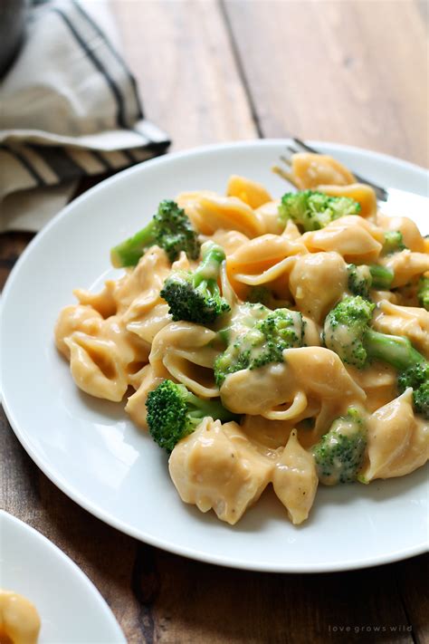 Reduce the sauce slightly and simmer until the chicken is completely cooked through and the broccoli tender. Chicken and Broccoli Shells and Cheese - Love Grows Wild