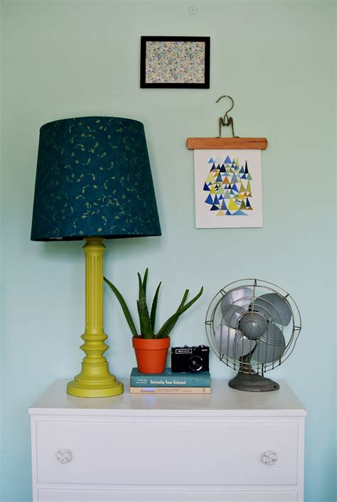 A good lamp shade will cover all of a lamp's hardware. How To Cover A Lampshade With Fabric