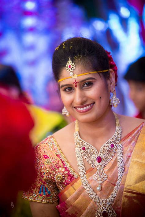 Traditional South Indian Bride Wearing Bridal Saree Jewellery And Hairstyle