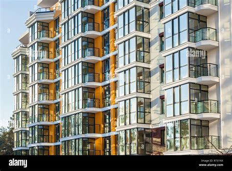 The Glass Facade Of Residential Apartments In A High Rise Building