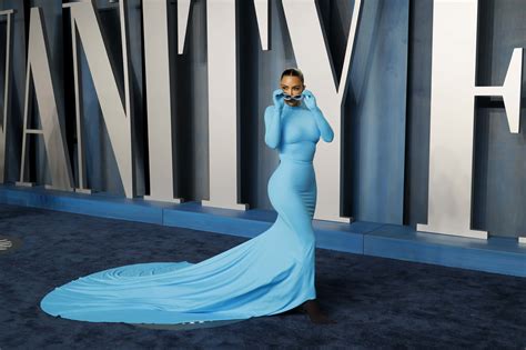 Kim Kardashian Flaunts Her Curves In Skintight Blue Balenciaga Gown At Oscars After Party Meaww