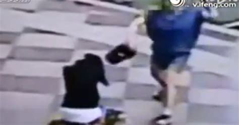 Video Of Mother Beating Her Child In Public For Playing Truant In China