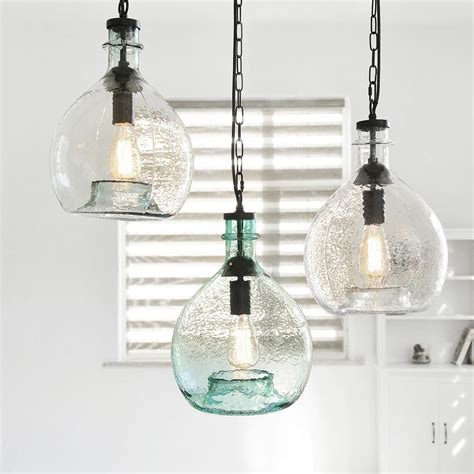casamotion 17 in h and 11 in w 1 light black wavy hammered hand blown glass pendant with g