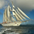 美丽的帆船图片-辽阔的大海里美丽的帆船素材-高清图片-摄影照片-寻图免费打包下载