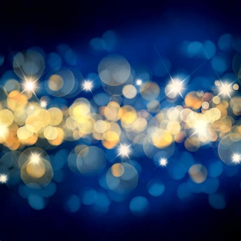 Free Photo Blue And Gold Christmas Background With Bokeh Lights And Stars