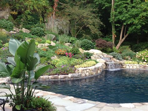 A Stunning Color Palette Surrounding The Pool Gives This Landscape A Natural Beautiful And