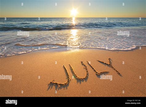 July Word On Sea Sand Nature Cpmposition Stock Photo Alamy