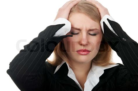 business woman holding head stock image colourbox