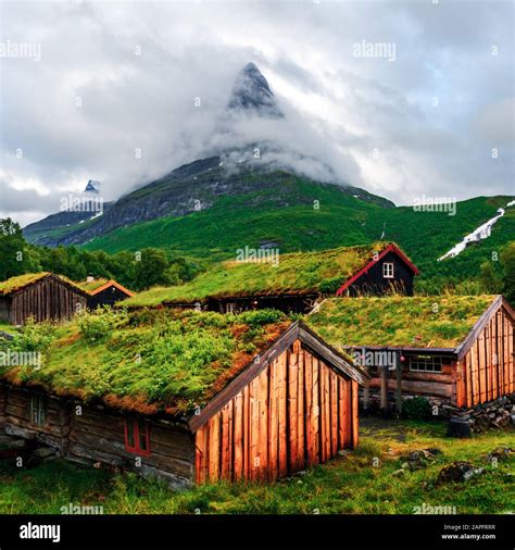 Typical Norwegian Old Wooden Houses With Grass Roofs In Innerdalen
