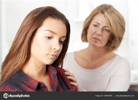 Mother Worried About Unhappy Teenage Daughter Stock Photo By