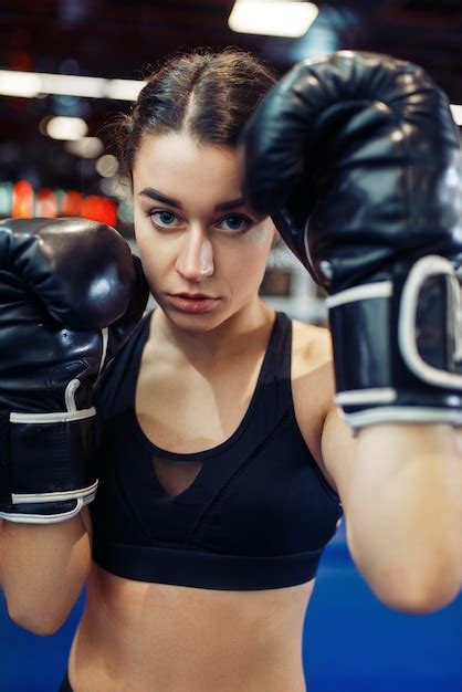 Premium Photo Woman In Black Boxing Gloves In The Ring Closeup Front View Box Training