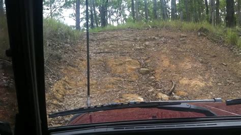 F Daihatsu Rocky Going Along A Sometimes Muddy Track In Candole State