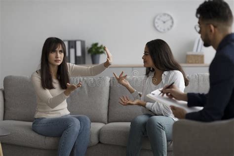 lesbian arab couple on verge of breakup seeking professional help arguing on consultation with