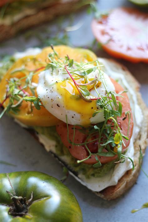Cream Cheese Avocado Toast With Heirloom Tomatoes And Poached Eggs