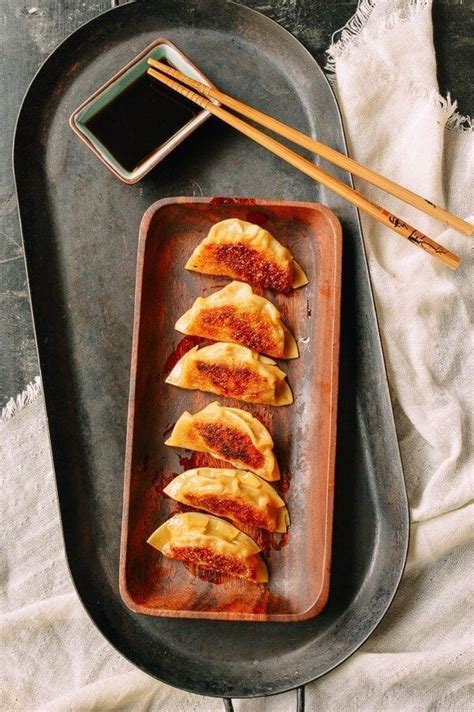 Add the dumplings in a circle. Japanese Gyoza Dumplings - The Woks of Life