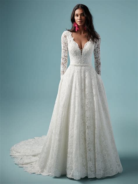 Beautiful collection of lace wedding dresses, including the boho wedding dresses and classic wedding dresses. Lace V-neckline Long Sleeve Ball Gown Wedding Dress ...