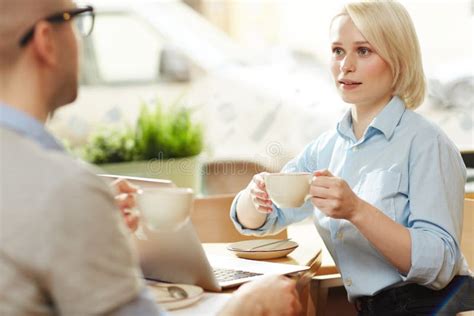 Coworkers Talking Over Coffee Stock Photo Image Of Sitting Coffee