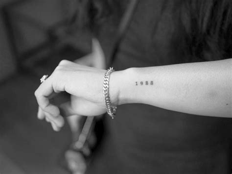 1988 Lettering Tattoo On Wrist