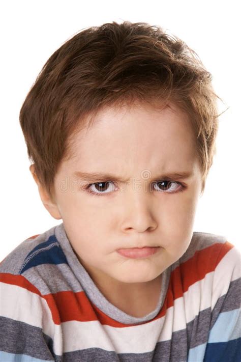 Angry Kid Close Up Portrait Of Angry Little Boy Isolated On White