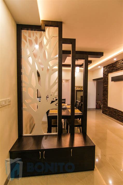 A bunch of paintings, photographs, some art or handicrafts to fill up blank walls. partition cum storage - Google Search | Wooden partition ...
