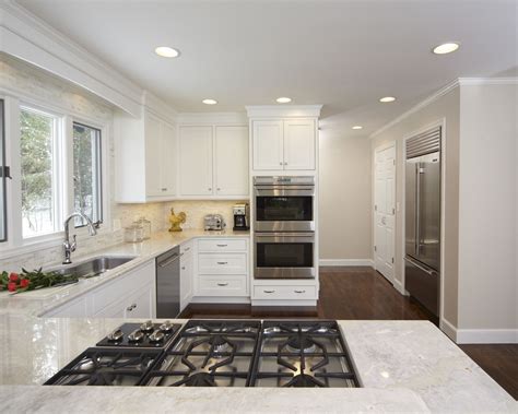 This white quartzite resembles the italian calacatta marbles in appearance, but is much harder and more durable. Taj Mahal Quartzite wtih White cabinets, light open ...