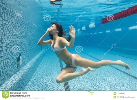 Underwater Woman Portrait With Pink Bikini In Swimming Pool Stock Image