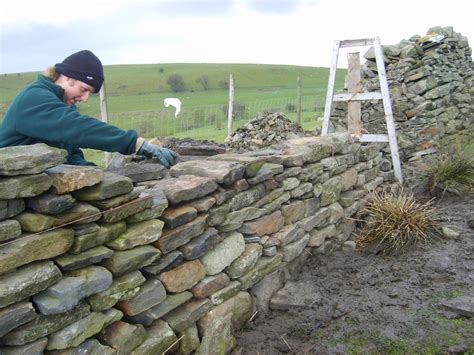 How To Build A Stone Wall With Your Own Hands