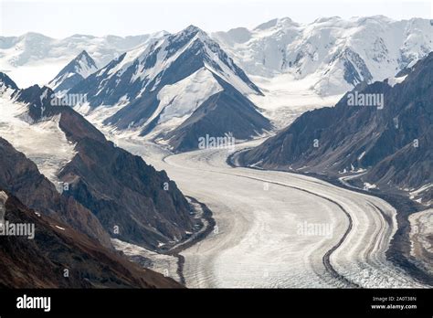 The Kaskawulsh Glacier Flows From Snowy Mountains In Kluane National