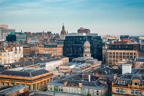 A Rooftop View Of The Mixed Architecture Of Old And New Buildings In