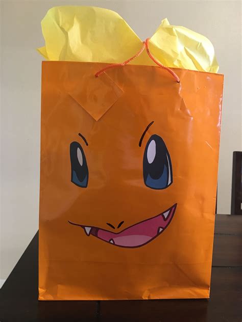 Quarantine birthday gifts ideas for him. charmander Pokémon birthday gift bag | Pokemon birthday ...