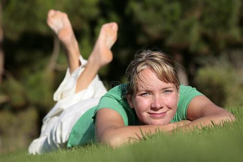 Woman Relaxing On A Lawn Stock Photo Image Of Park Lawn