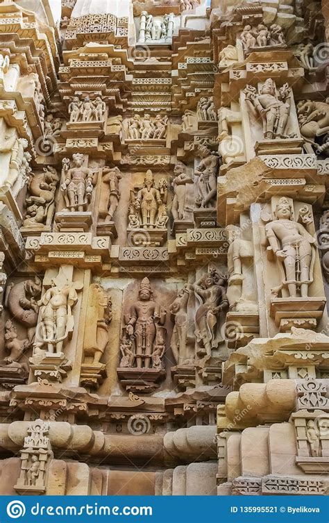 Stone Carved Erotic Bas Relief In Hindu Temple In Khajuraho India