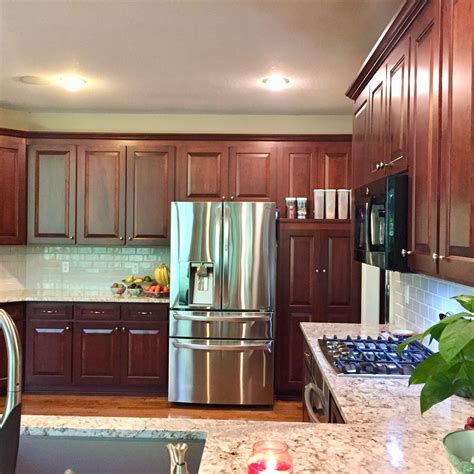 You can still use your kitchen while refacing. Cabinet Refacing vs. Refinishing - Midwest Kitchens ...