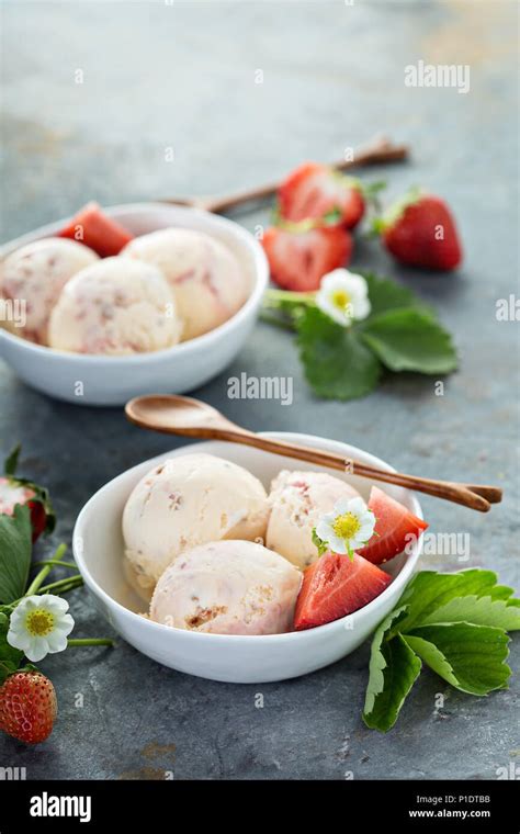 Strawberry Ice Cream In White Bowls Stock Photo Alamy