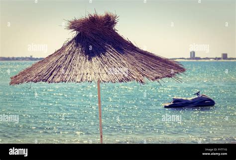 Straw Beach Umbrella Stock Photo Alamy