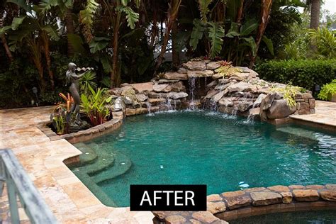 Lagoon Pool Remodel With Natural Stone Waterfall And Large Travertine