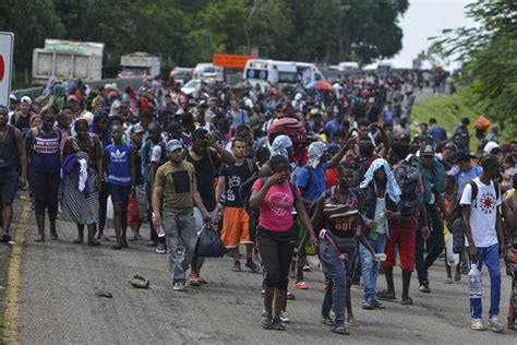 Hundreds of migrants corralled at detention center in ...