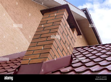 Red Metal Roof Tiles Shingles With Roofing Construction Stock Photo Alamy