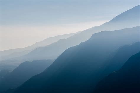 Hd Wallpaper Mountain Covered With Fogs During Daytime Hills Blue
