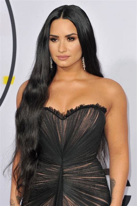 Demi Lovato Wavy Black Side Part Hairstyle Steal Her Style