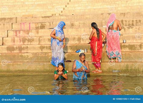 Hindu Women Taking A Ritual Bath In The Holy Ganges River Editorial Photo