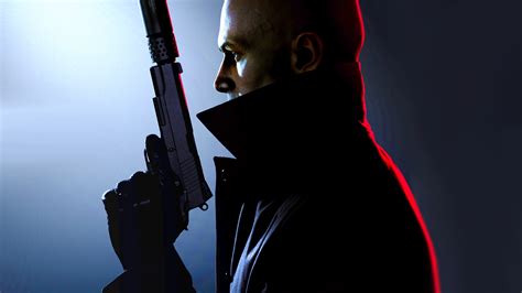 Agent From Hitman Holding His Pistol Close To His Chest Pointing Upwards